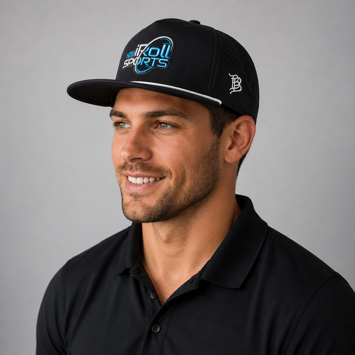 Man wearing a black cap with How iRoll logo side profile.