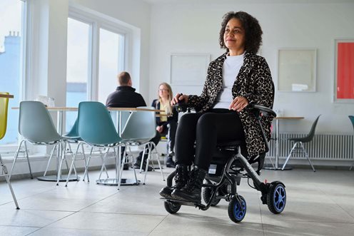 Quickie Q50 R Carbon Folding Powerchair - at airport