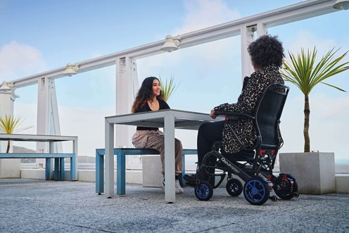Quickie Q50 R Carbon Folding Powerchair - at lunch
