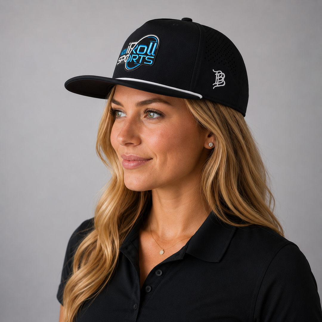Woman wearing a black cap with How iRoll logo side profile.