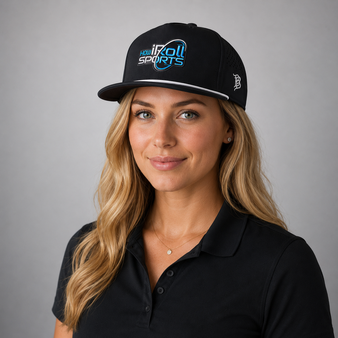 Woman wearing a black cap with How iRoll logo front view.